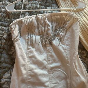 12th Tribe strapless white denim minidress with diamond fringe